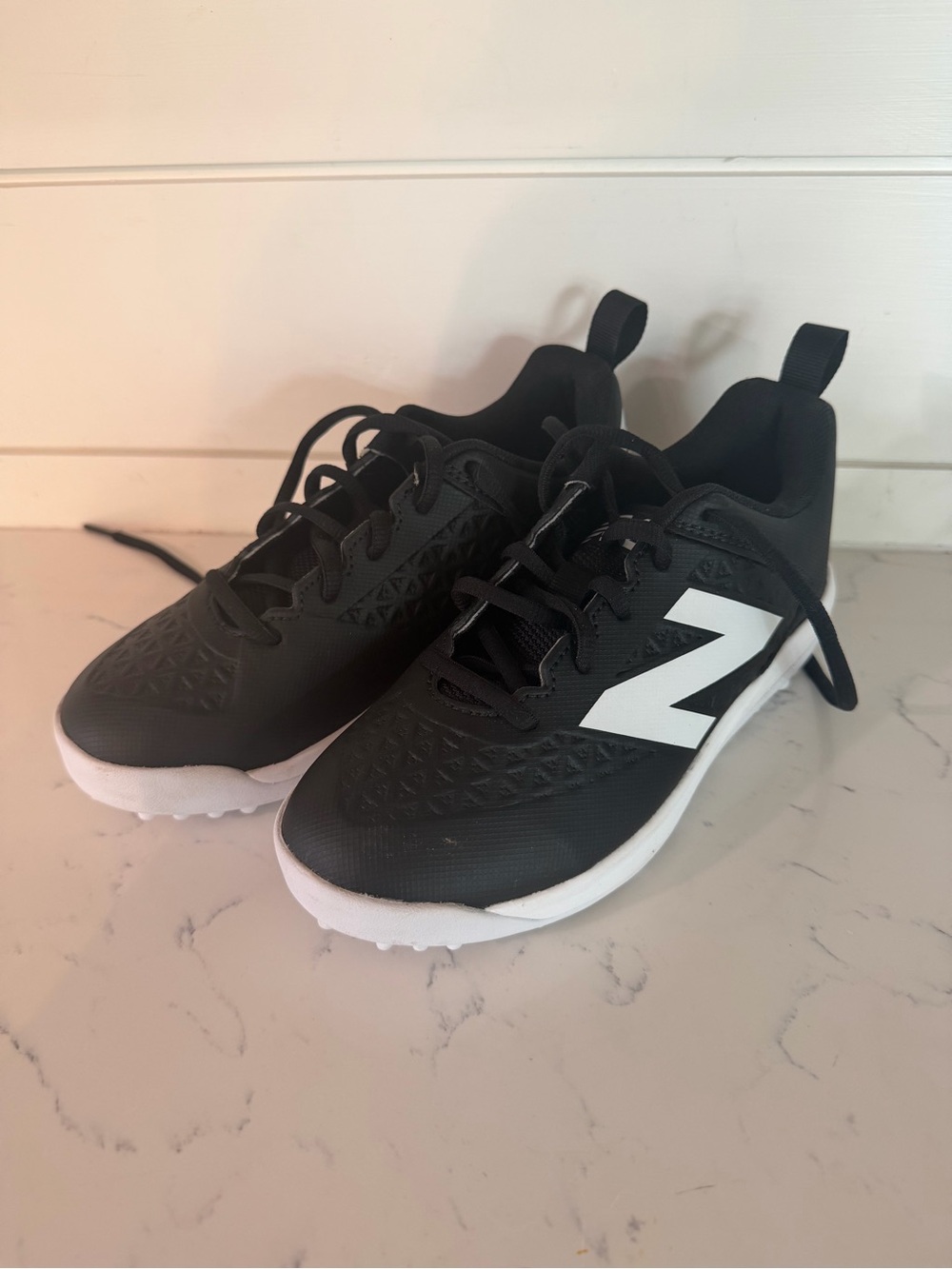 NWOT New Balance Kids' Black Turf Cleats